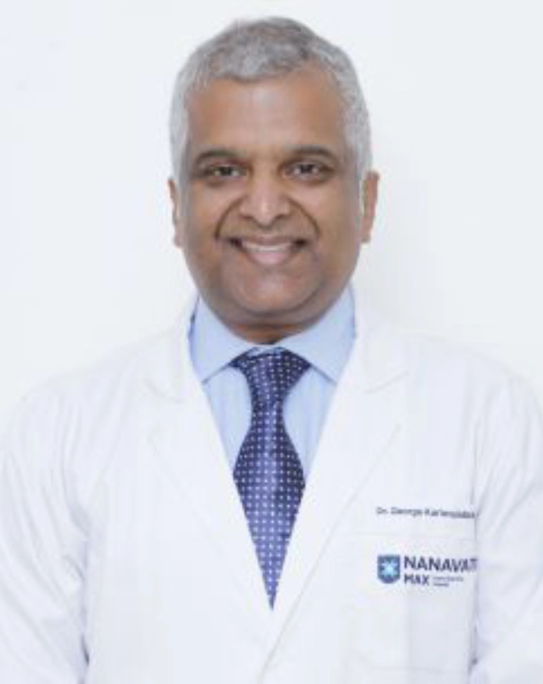 Dr . George Karimundackal